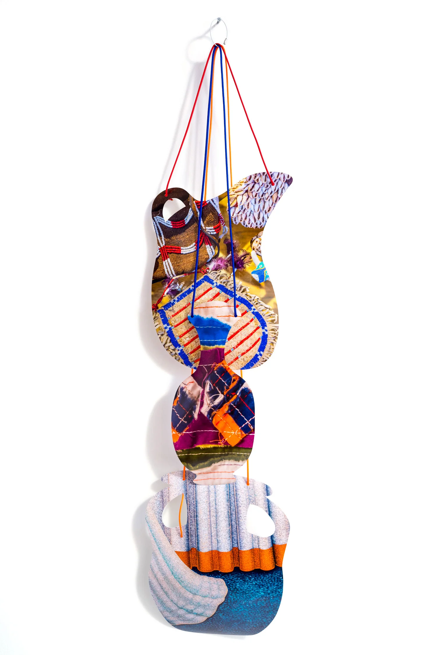 Rejoining Roger Brown:  Virtual Still Life: Service with a Smile , 2016  cut-up inkjet prints, paracord, cable rings  dimensions variable 