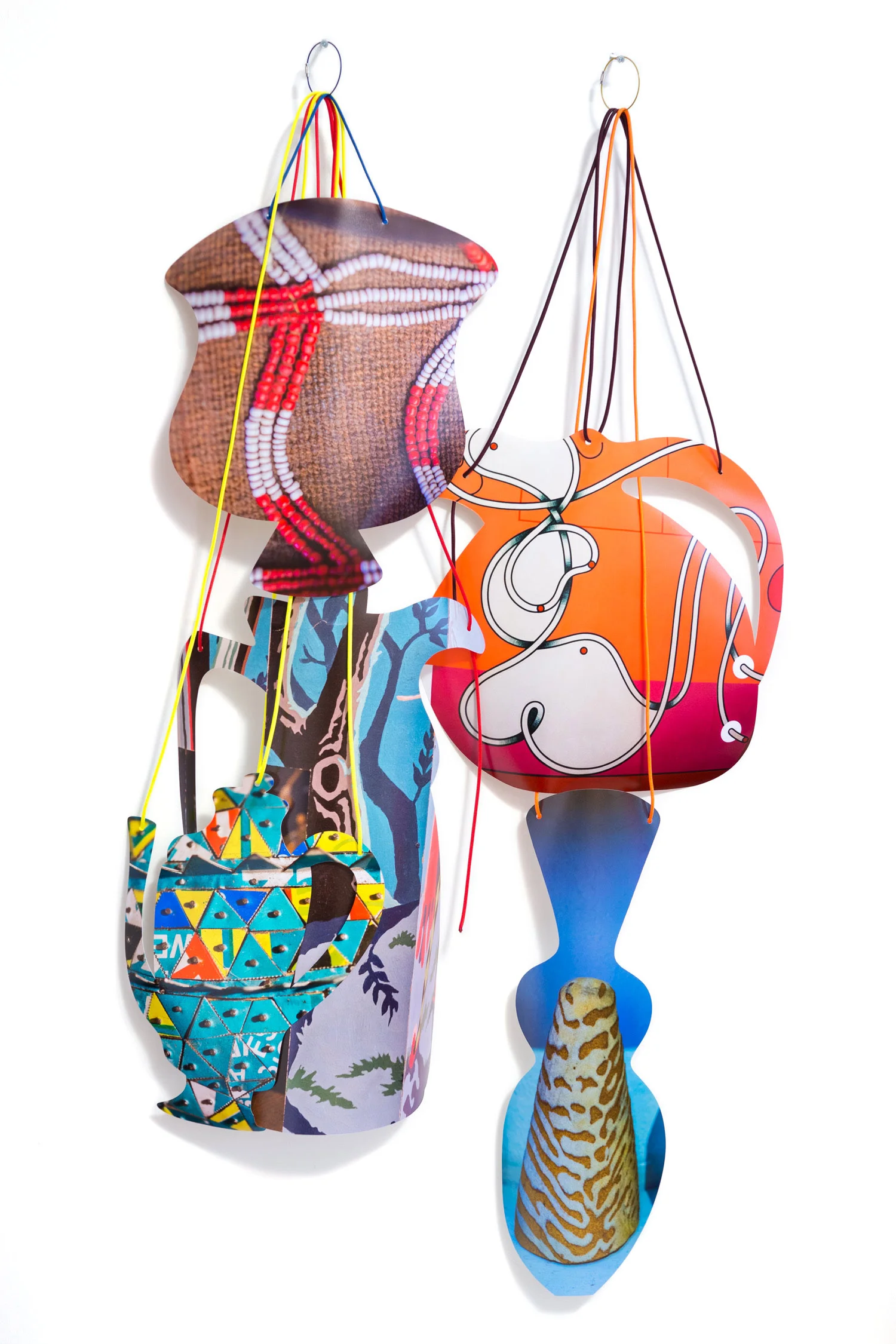  Rejoining Roger Brown:  Virtual Still Life: Service with a Smile , 2016  cut-up inkjet prints, paracord, cable rings  dimensions variable 