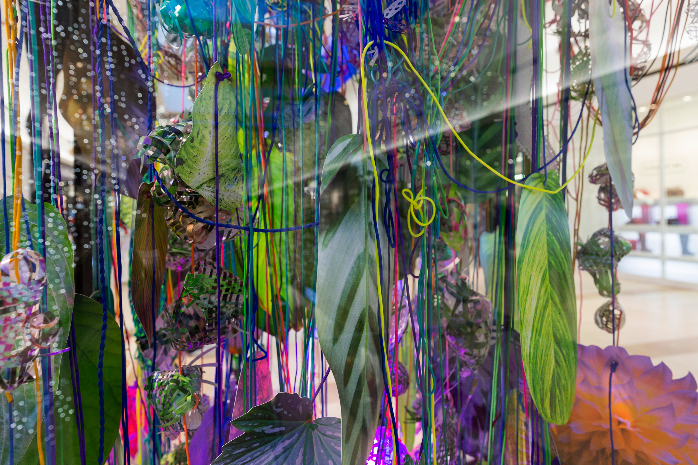  Gusts in the Hothouse, 2016  cut-up inkjet prints, paracord, miniature clothespins, grow lights, oscillating fan  5 x 5 x 7 feet   Gusts in the Hothouse , The Collection: Where Art Meets Fashion, Rosemont, IL 