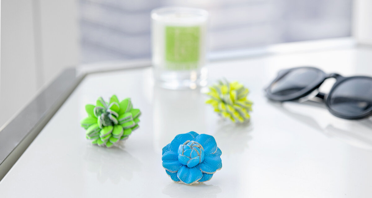 Fleur'd Pins Earth Day banner featuring neon leather lapel flowers - photo by Andrew Werner.jpg