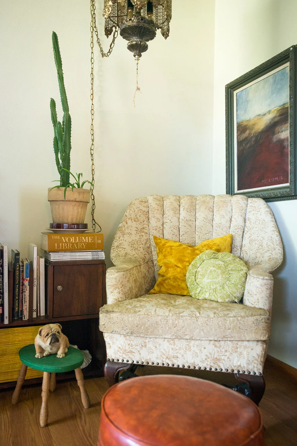 The little bulldog was my grandpa's as was the awesome light hanging above. Another Olaf Bisschoff hangs above the chair and my dad's old footstool in front. Plus the ever-present National Geographic mags. 