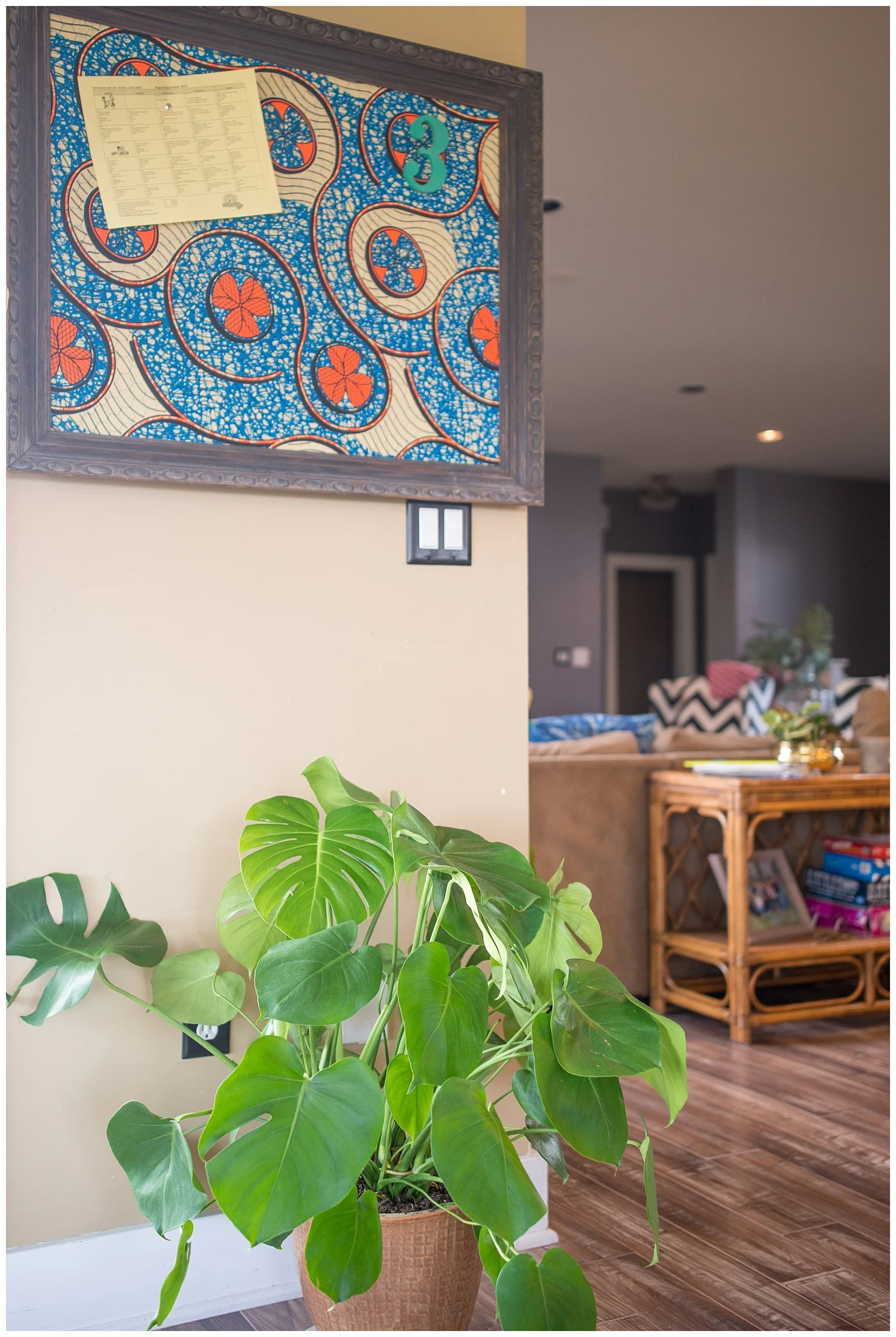 This is an example of a pinboard that you can find in both Fresh Digs and her online shop. This particular one was made with African wax print fabric that I brought back from South Africa. This view is from the sunroom looking into her wide open living room. 