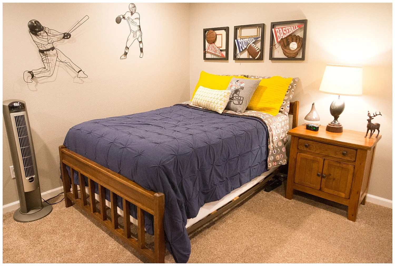 Garrett's room is all boy. The bed she discovered in an old dilapidated garage on a property that her parents owned. The other furniture came from Uebinger's. Odds and ends are from Target and Hobby Lobby.