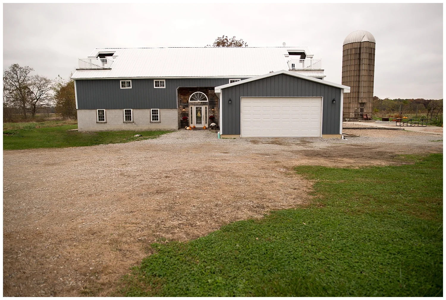 And the beautiful "after". Note the two balconies and the silo. Hanging from the roof of each balcony is an original piece from the barn's hay carrier system - a reminder of the work-horse this house used to be. 