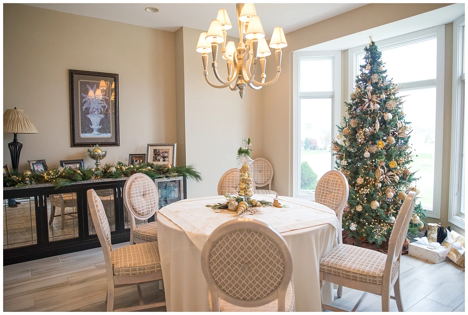 The Gold Tree resides in the dining room with Patty's favorite thing in her home - her buffet. These are the chairs that she transformed from restaurant dining chairs to these magazine-worthy numbers. 