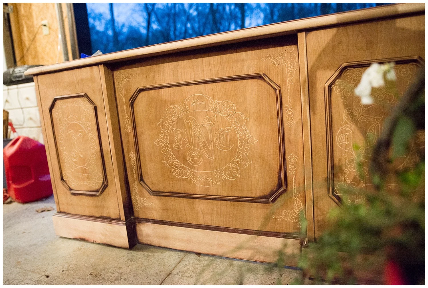 Chandra showed us this piece in the garage. Carving meaning into this executive desk is Ray's current project and he's busy carving the family tree into the sides of it.