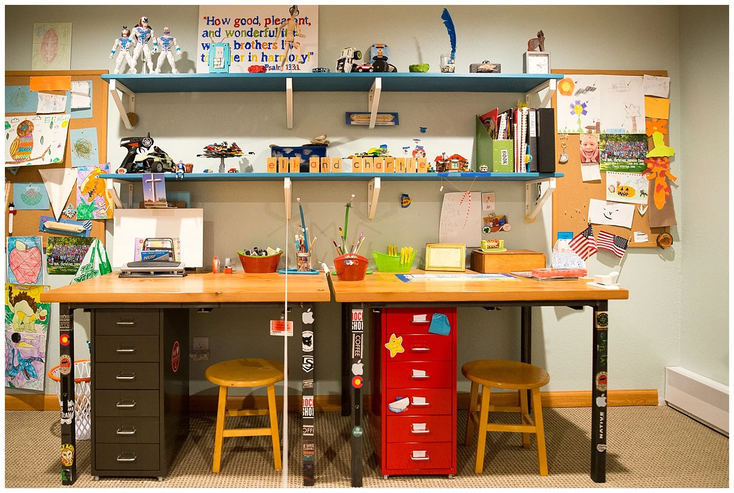 Uncle Aaron made the desks for their birthdays, one of their favorite things; the stools were previous bar-height stools used at the Café and the boys requested the pin boards as a way to display their artwork. Next time you see Christy ask her about the Psalms art project. : )