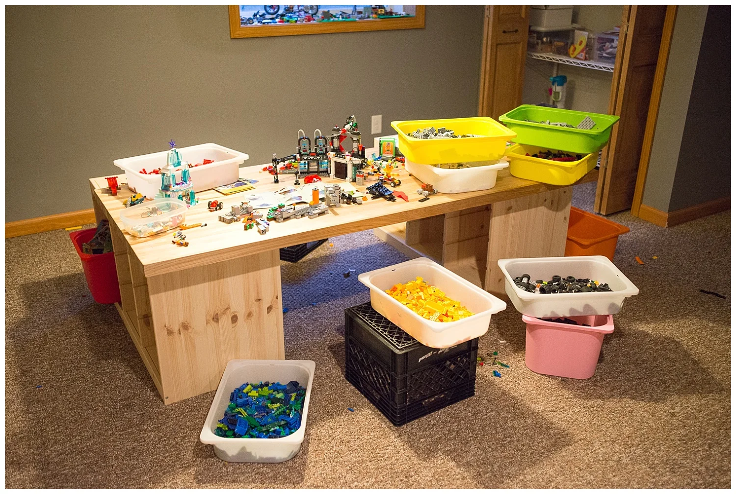 Just outside of the boys’ room is a Lego table complete with bins separating the different colors. Kevin said doing this helped reignite their love for Lego. The bins slide into the Ikea base and he found a top to unify it at, you guessed it, the John Boos Outlet. 