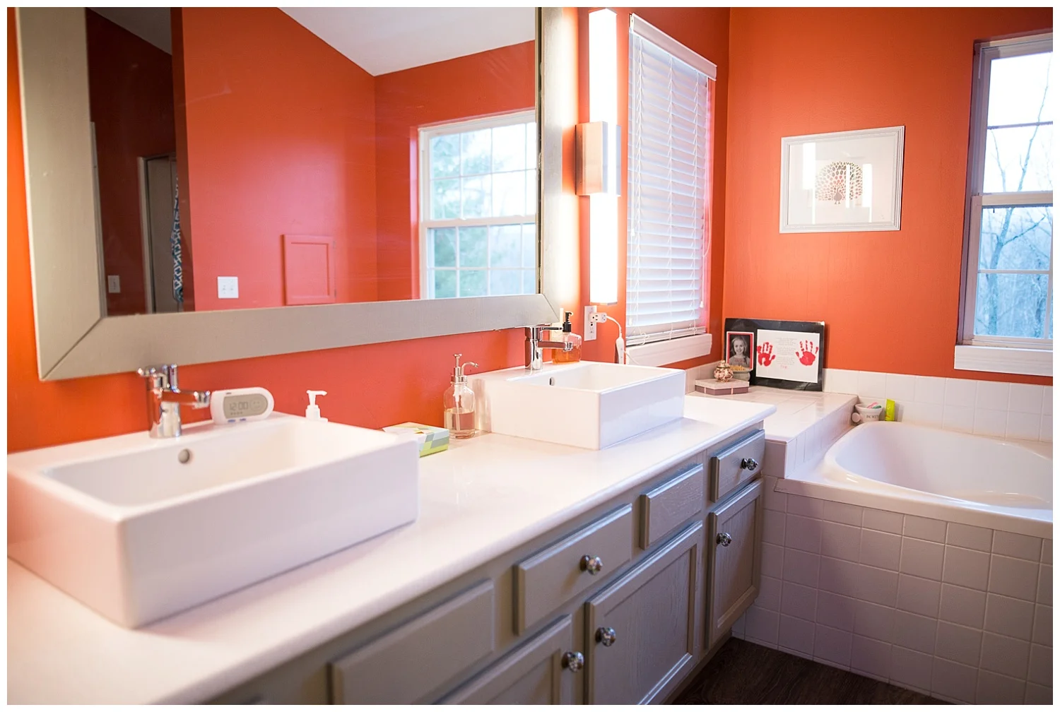 How fabulous is this? Clean lines and a nice bold color. They recently redid the bathroom and she says yes, she actually uses the tub. 