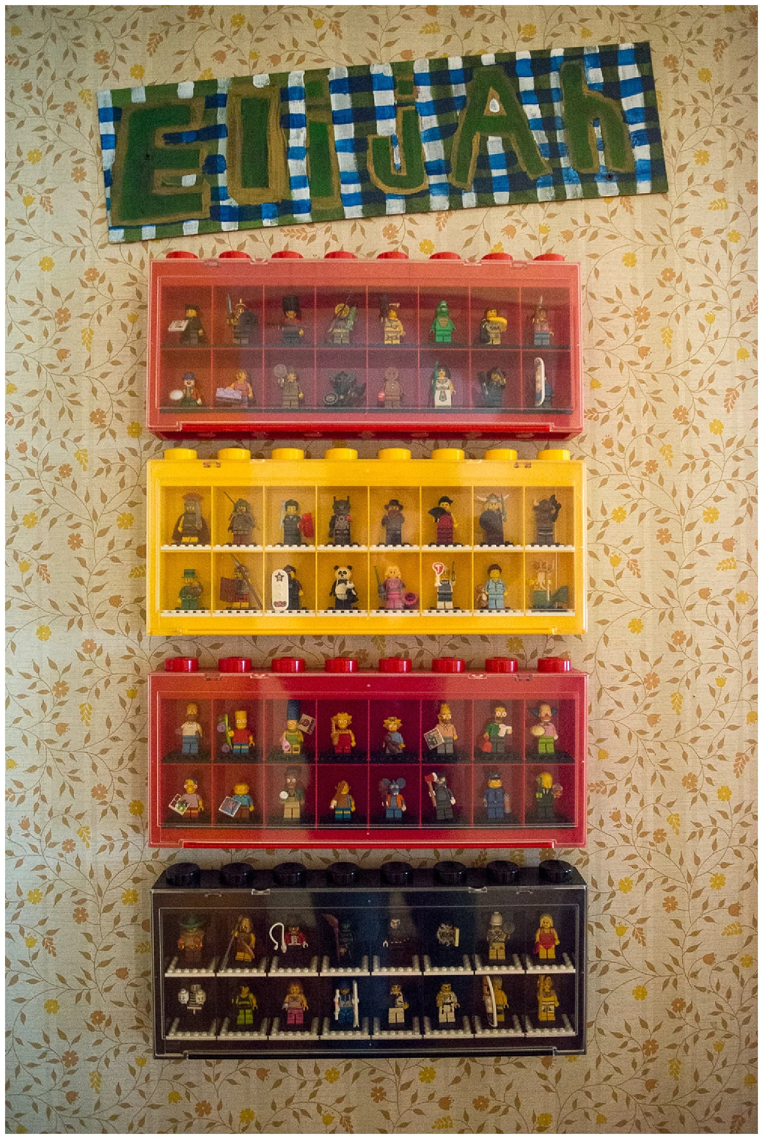 Eli's room. I wish they still made these Lego man boxes. And that wallpaper.
