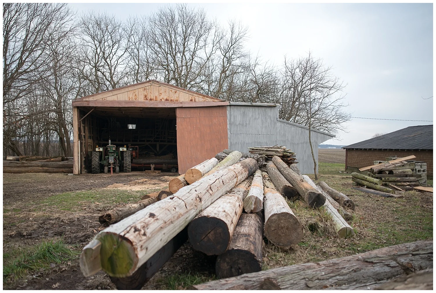 Where the milling happens and to the right is his wood shed.