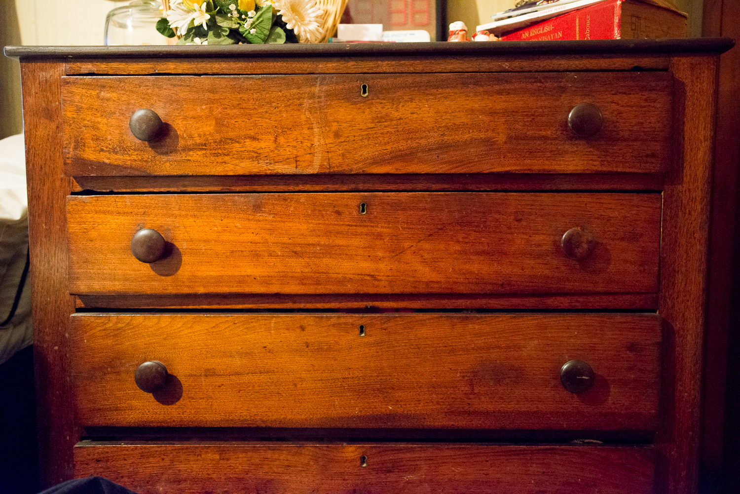 Out of everything that Rick has made or found this dresser is his favorite thing. His great, great grandfather made it out of walnut and he planed it with a piece of glass. 