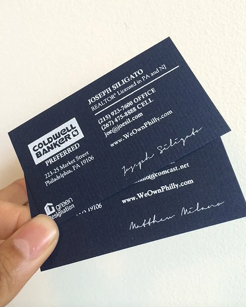  1/0 screen printed business cards. White ink on textured laid neenah patriot blue paper. 
