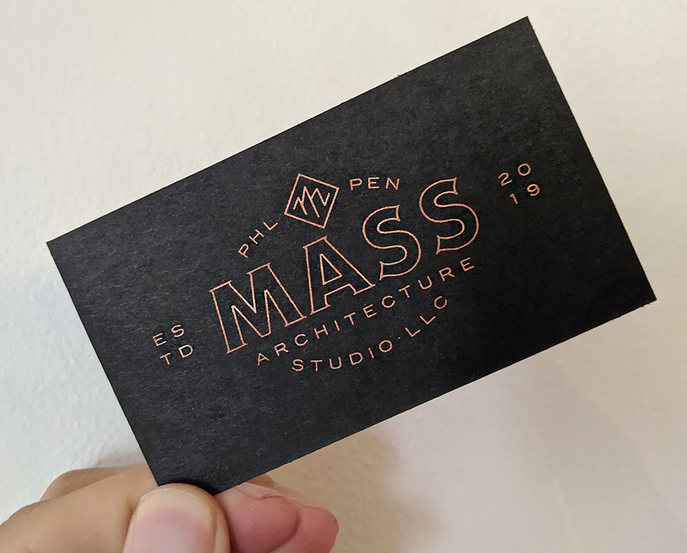 Metallic copper screen printing on 140lb. black french stock.
