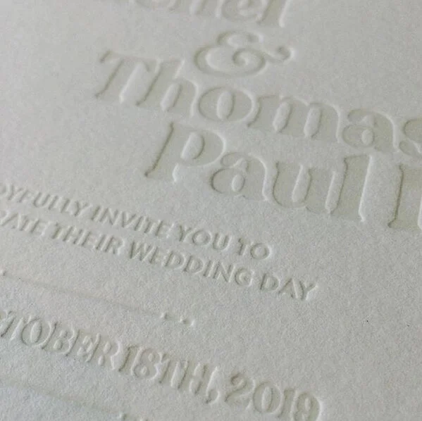 One color letterpress with light smokey ink on 220lb. flo white lettra. 100% cotton stock.