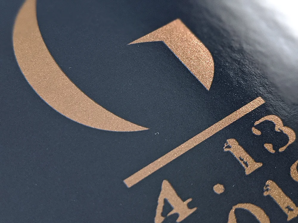 Digitally printed sticker with Spot Foil UV coating.