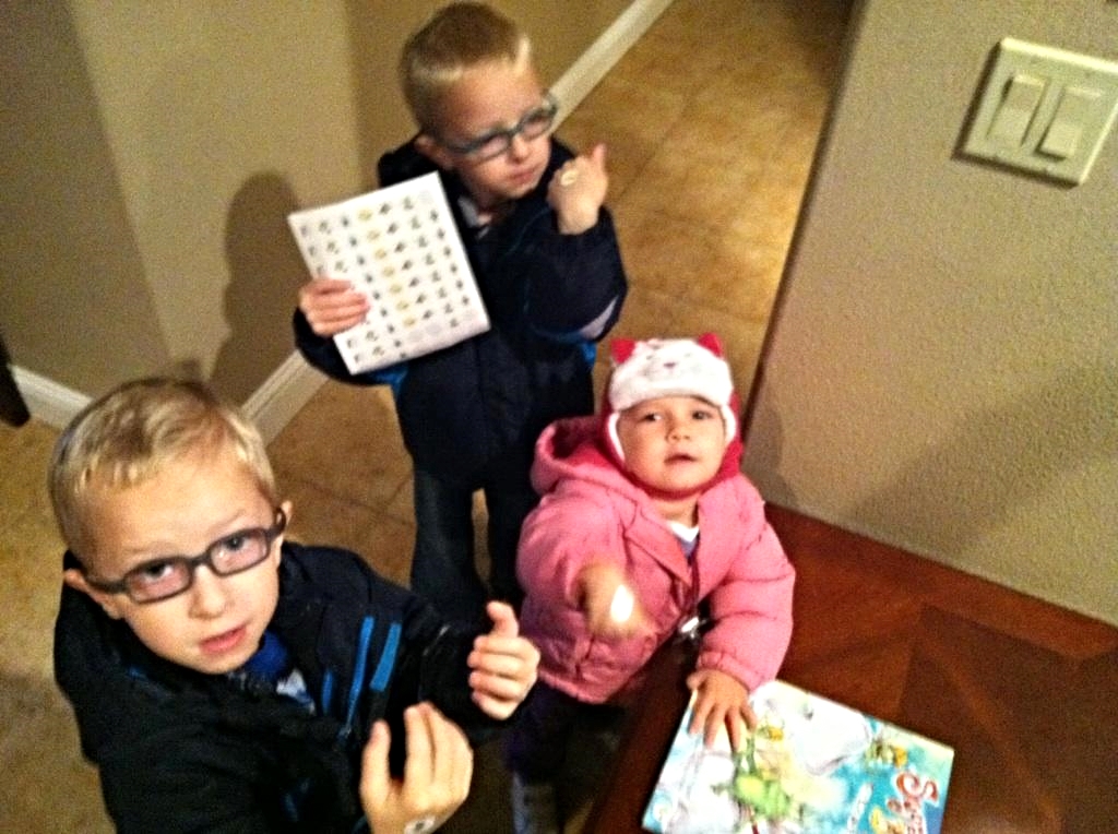 In the Bathroom brushing and putting stickers on the calendar!