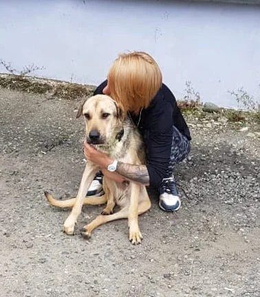 Masha gives me a hug good-bye. 