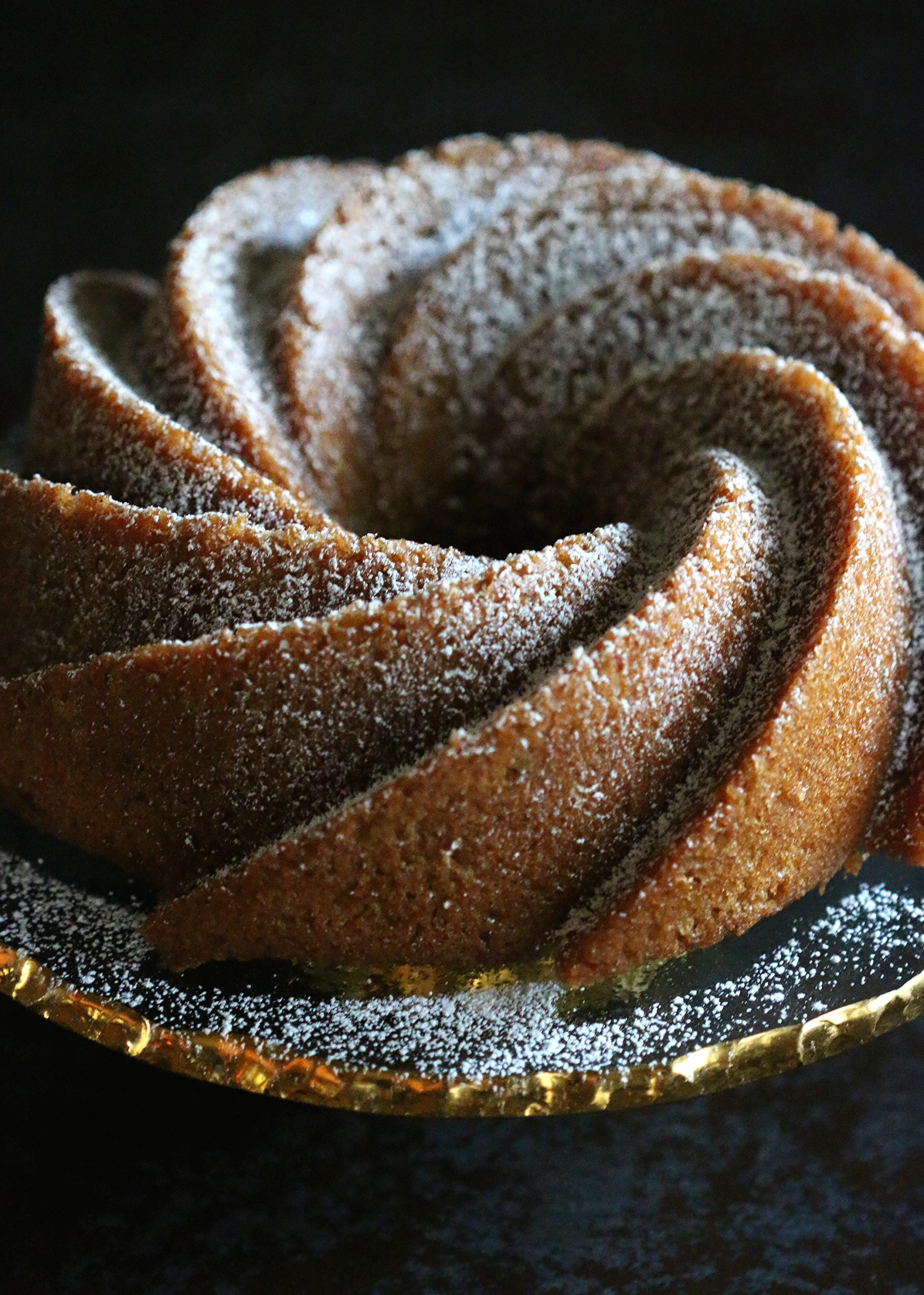 If you use a slightly smaller (10" diameter 10 cup) bundt pan you will have enough batter left over to fill 4 mini bundt pans. Mini treats for yourself. 