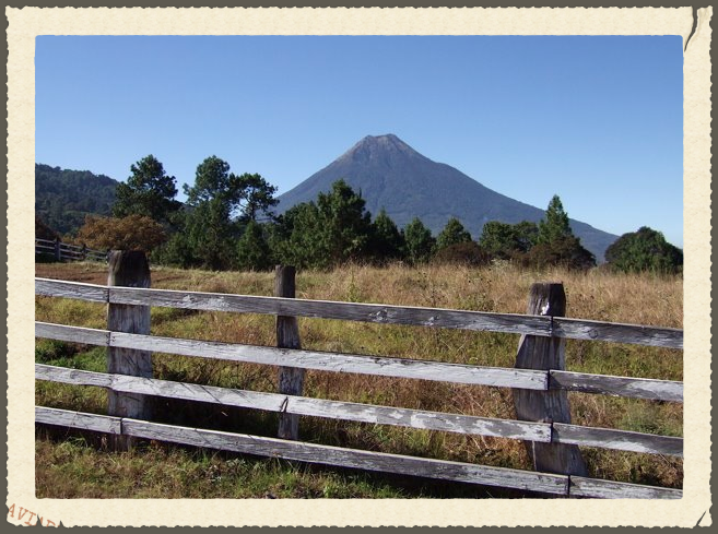 Fuego the Volcano, the view from a trail at Finca El Pilar in Guatemala.