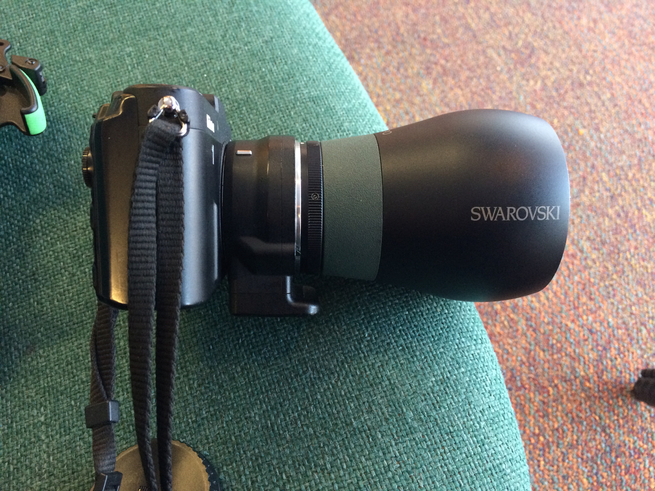 This is my Nikon V1 with the Swarovski TLS APO adapter that I use with my Swarovski scope. Below are some images I've taken with this set up.