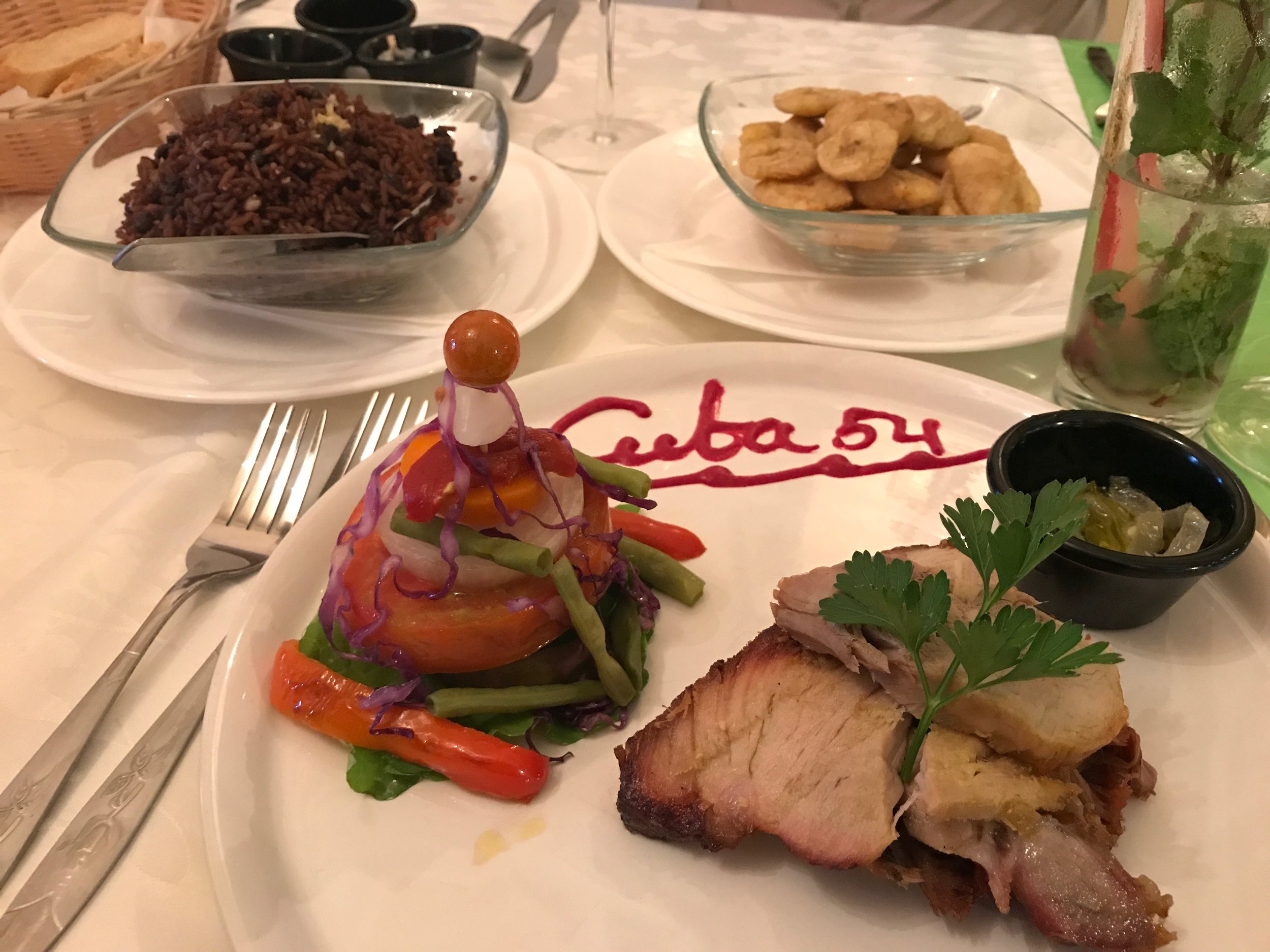 A dish of roast pork and vegetables in Havana