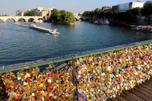 Gross gross gross! Love locks on the Pont des Arts last summer. Now most parts of the bridge are covered with gratified plywood...classy.