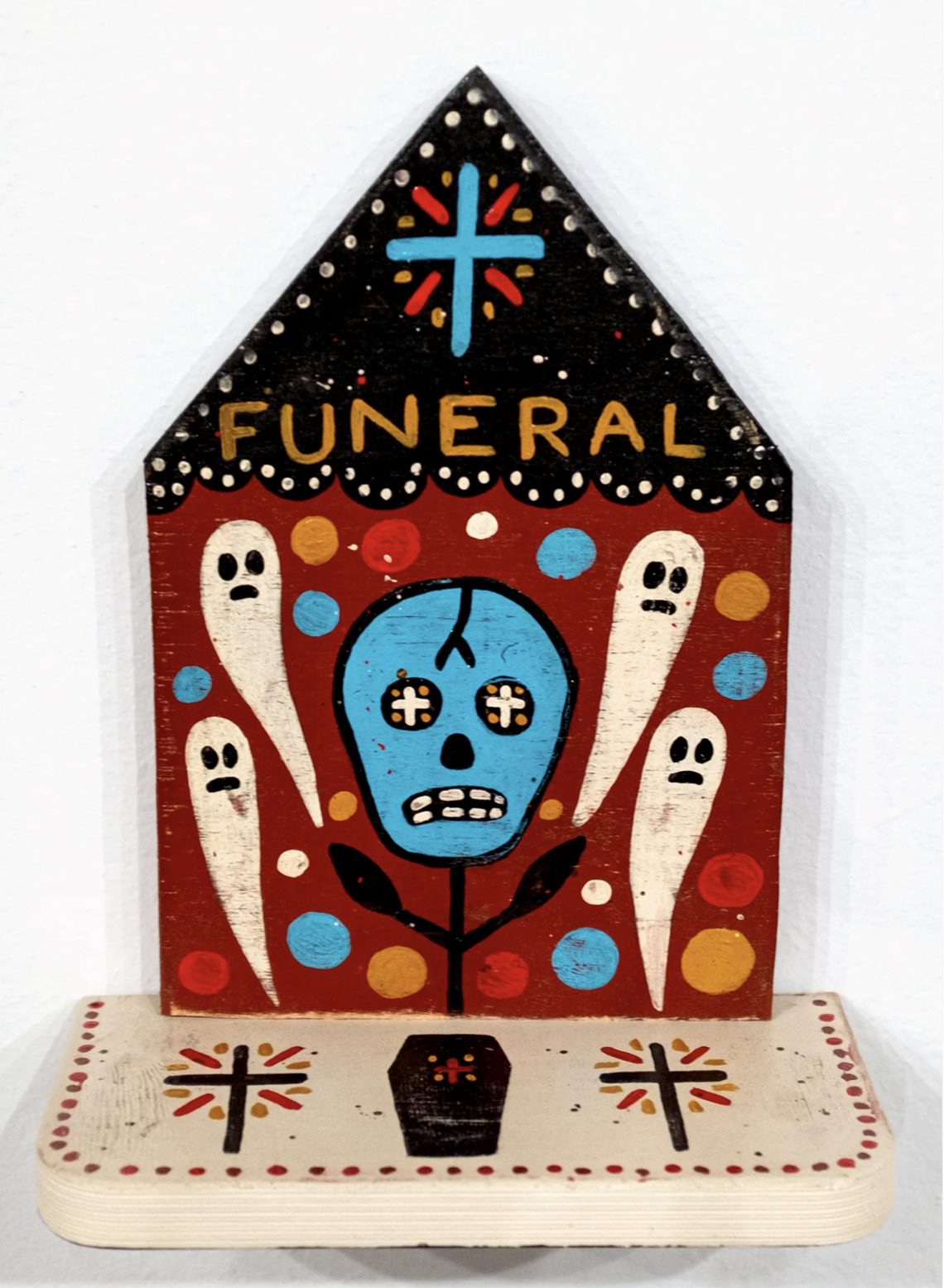 dark red funeral home.png