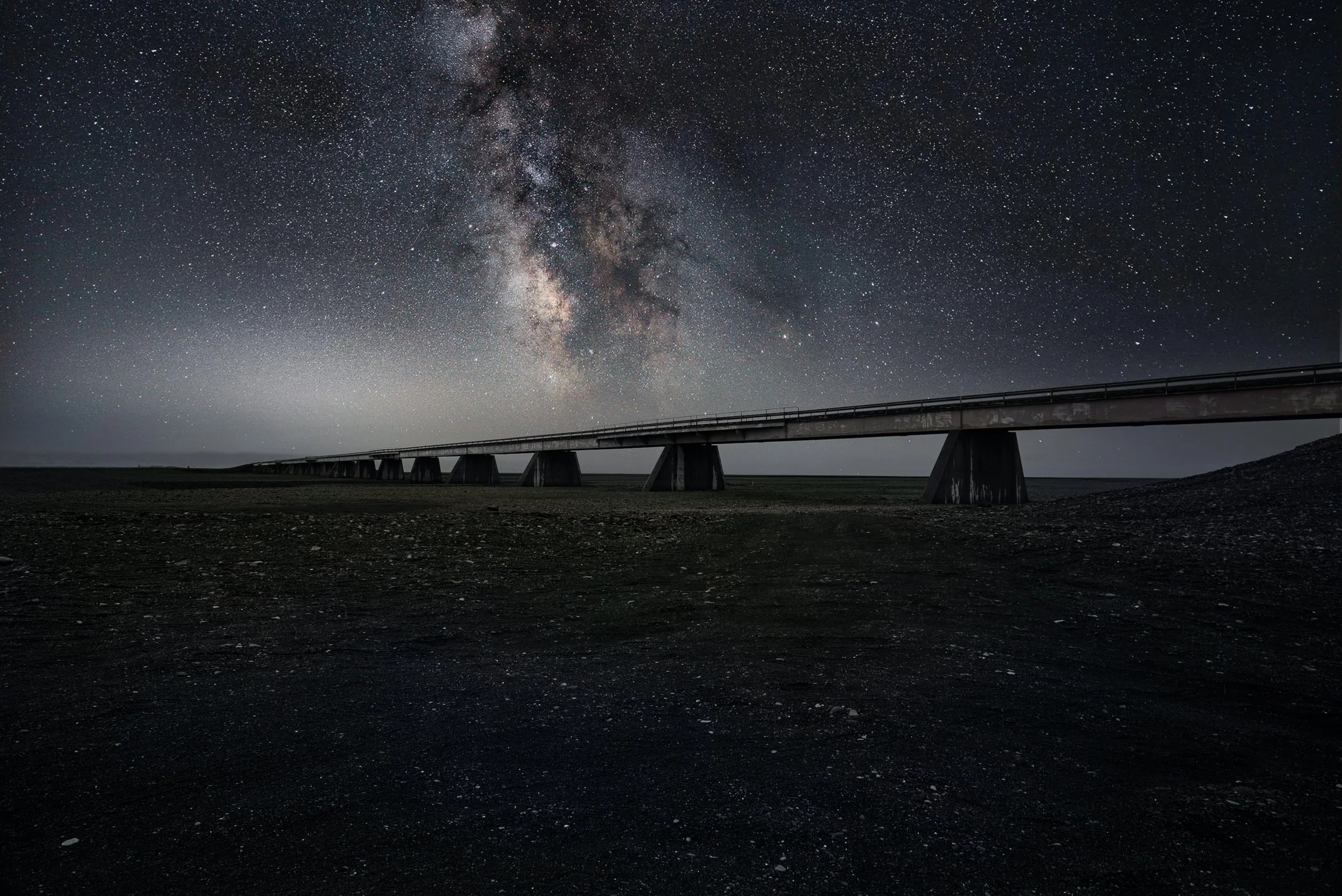 Destination Unknown:
The bridge extends the into night, but offers no promise of arrival. Suspended between earth and sky, it becomes less a structure than an idea: movement without certainty. Every crossing holds this truth—that we go not to ar