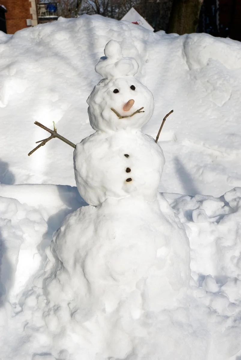 Snowman doing a sun salutation