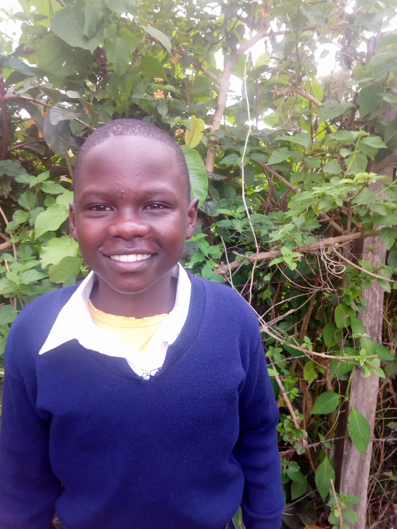 036-Spencer Mugita-13-8th grade-10-29-17-Blue-Ugali&Kale-Dog-Science-Doctor-05-13-2018pic-Orphaned2005-CCMI2014.jpg