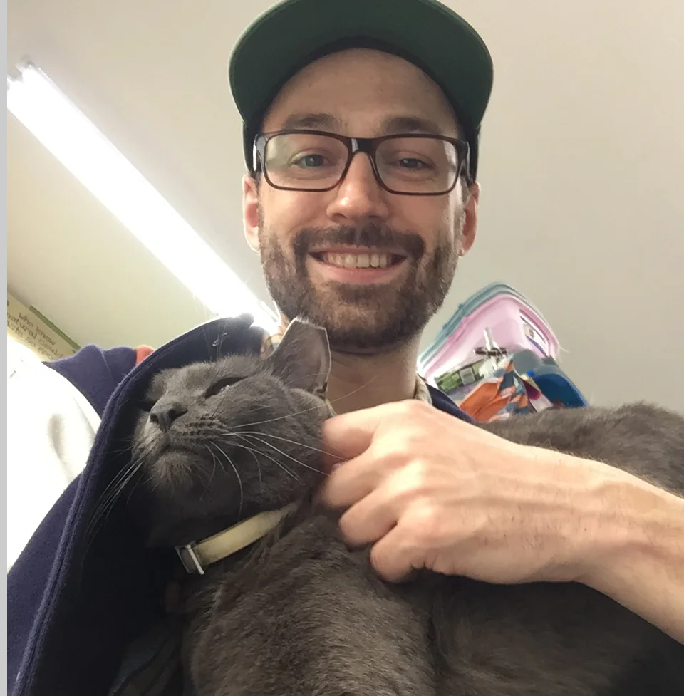 Balun Bio Pic with cat.JPG