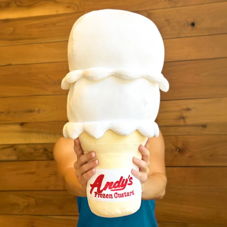 Female holding Andys Frozen Custard Cone Squish Plush Toy