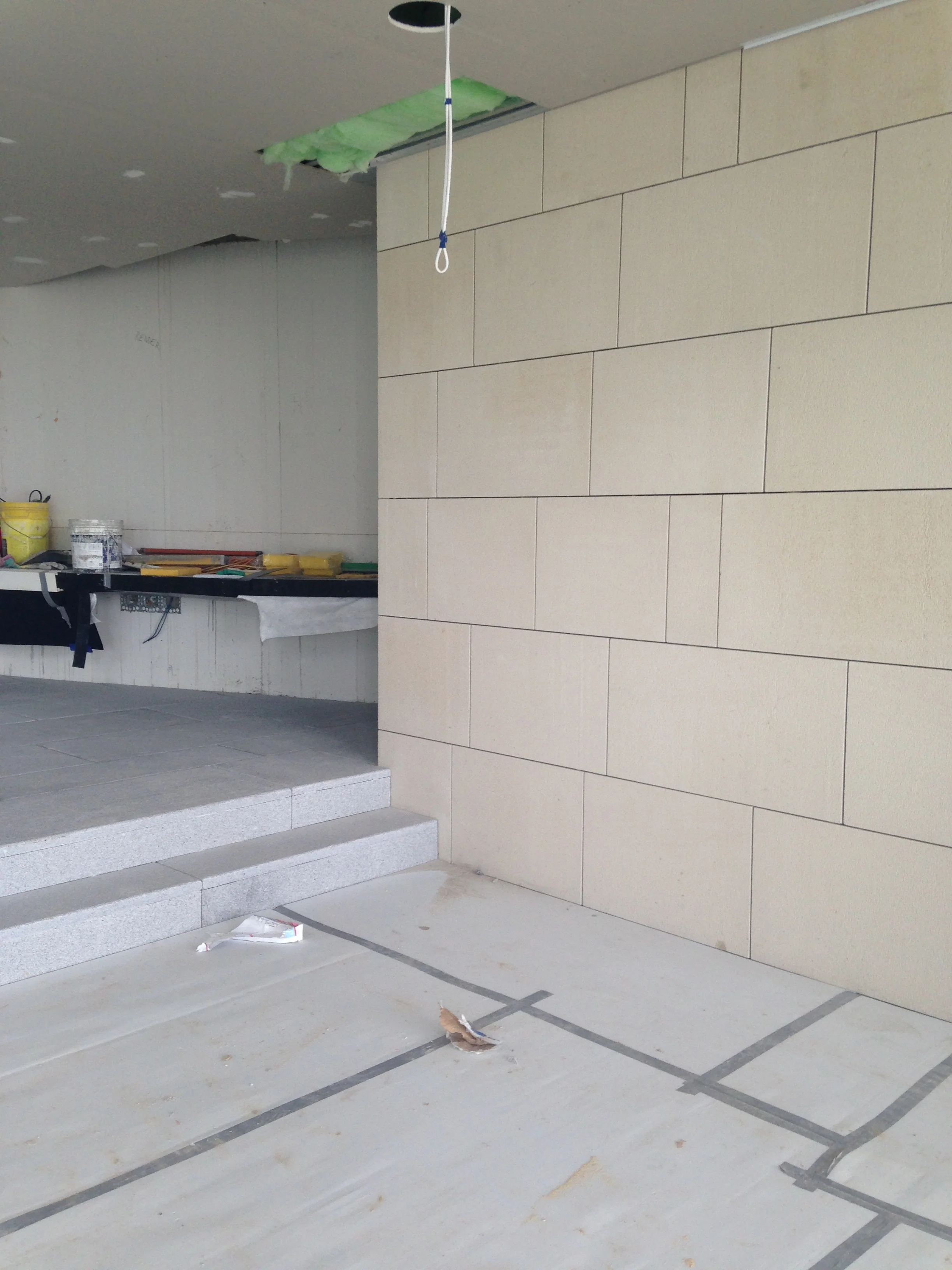 The neutral calming palette is made up of textured layers to differentiate the spaces in the open plan layout.