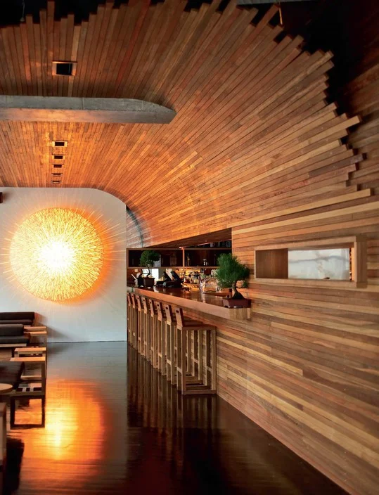Toko Japanese restaurant on Crown Street in Surry Hills has been a mainstay of dining in Sydney for many years. The timber clad interior with the feature light installation remains as current as ever in this simple and elegant interior. 