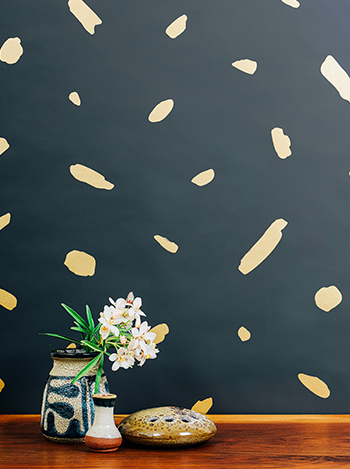 Finola is obsessed with Juju Papers ‘Pas De Trois’ hand painted wallpaper with it’s stunning gold paint on charcoal paper.
