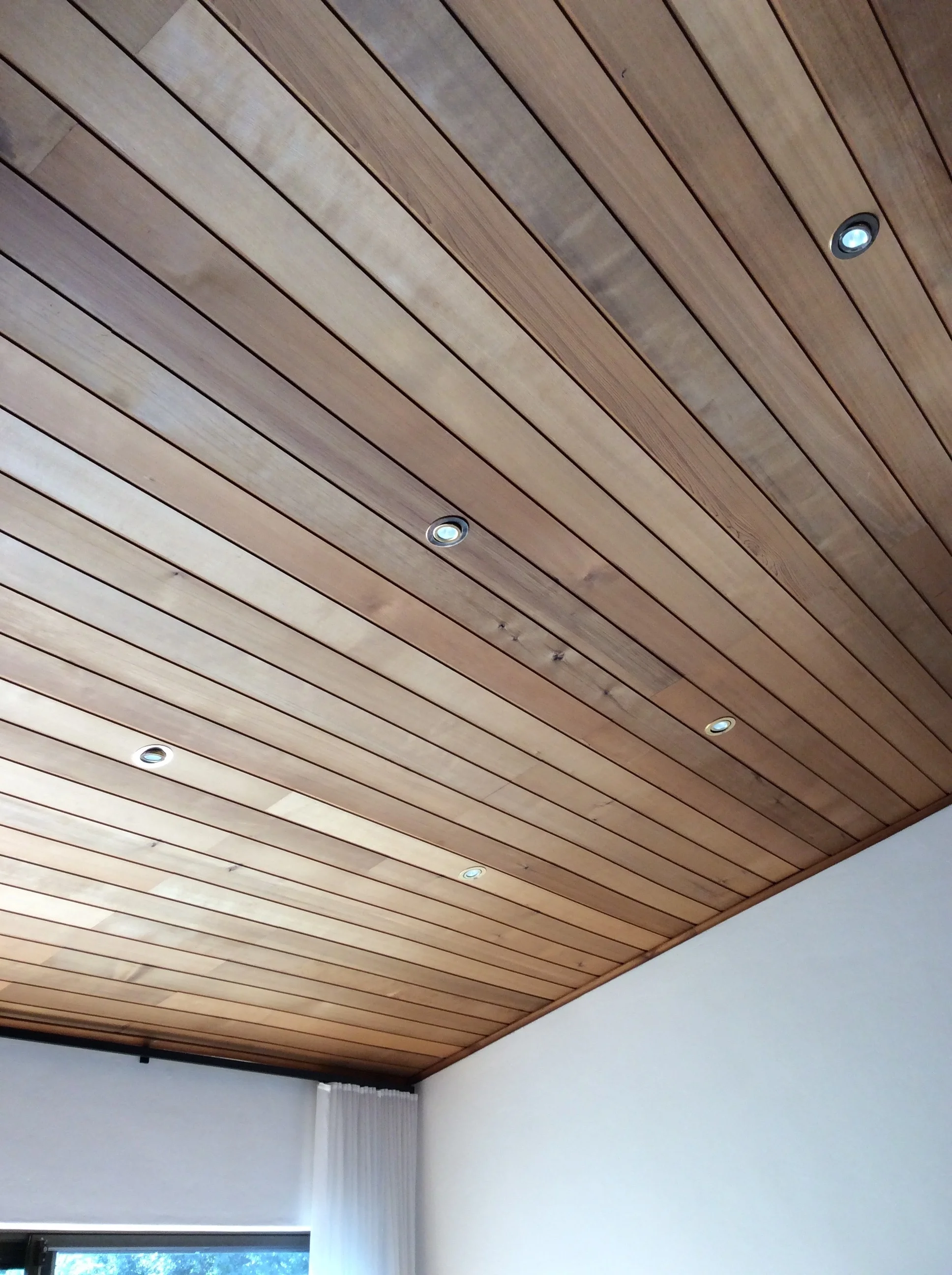 The original timber paneled ceiling in the kitchen space will soon be painted a fresh, crisp white.