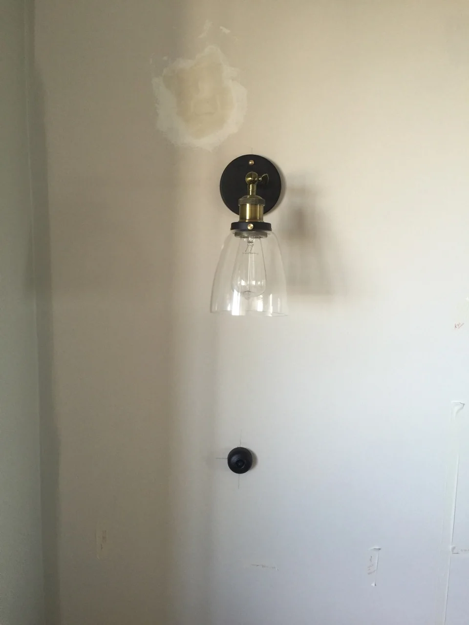 A re-finished vintage style light switch perfectly matches the sconce back plate. The devil is in the detail!