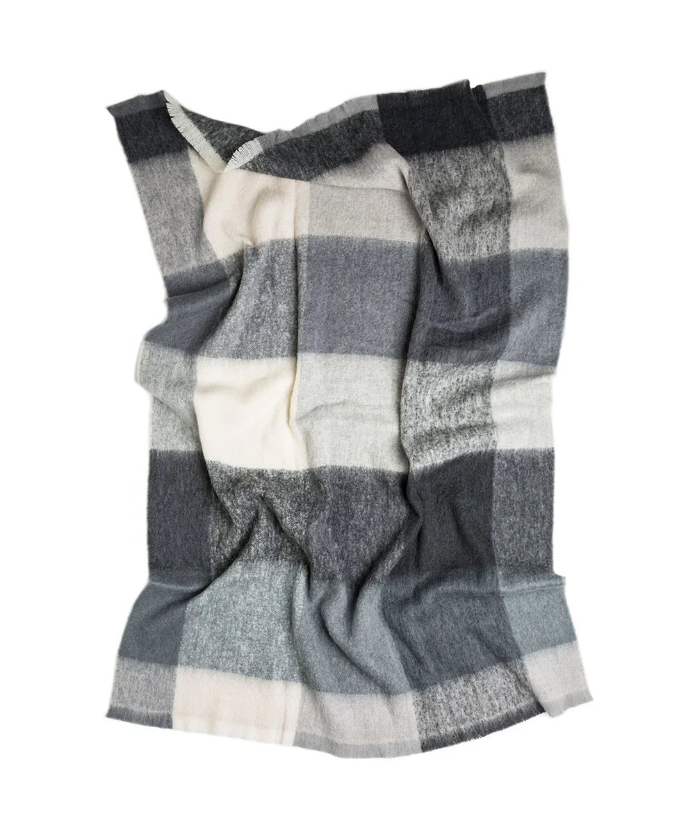 The 'Skipper Alpaca Blanket' from Kate & Kate is w oven from one of nature’s most luxurious fibres, this making it heirloom quality, incredibly soft and wonderfully warm.