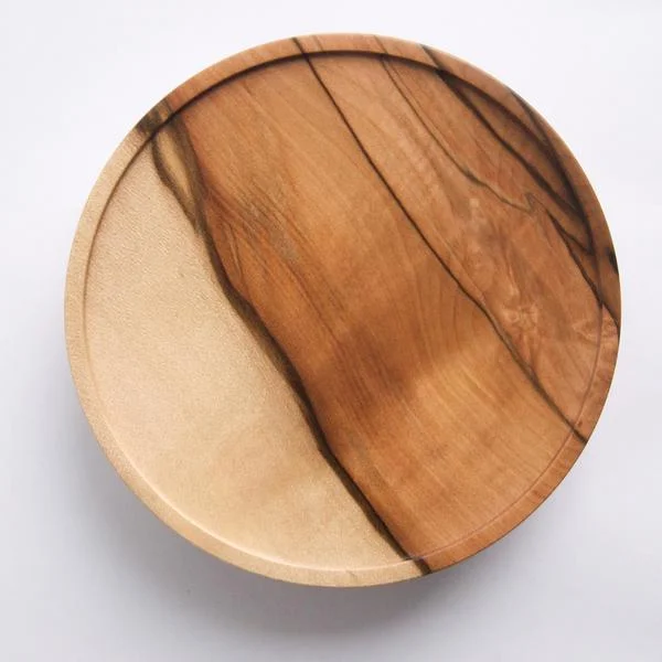 STUART’S PICK Stuart is loving the brand Interia . Their raw timber Australian hardwood handles are uniquely Australian in their material, colour and texture, adding an earthy and sleek dimension to any cabinetry.