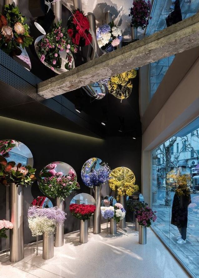 Brighten up these shorter, darker days with a beautiful blooming bouquet or two! Perfect for any season and any occasion. We love Alberto Caiola's contemporary interior design of Shanghai-based florists, July’s Flower. The large mirrored dishes result in a cornucopia of blossoms reflected ad infinitum.
