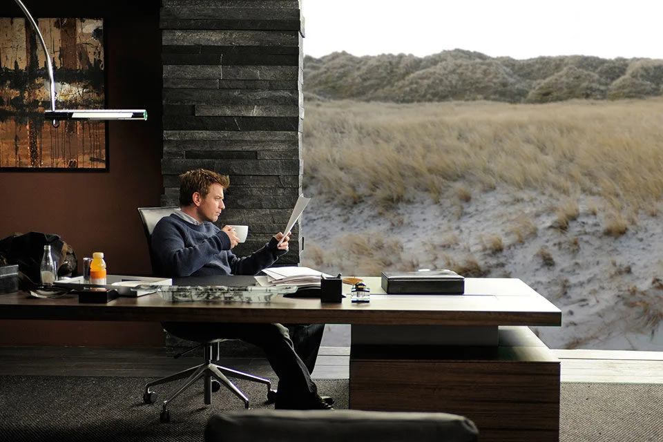 The masculine, moody and minimalist interior from Roman Polanski's The Ghost Writer creates an incredible connection between architecture and landscape. 