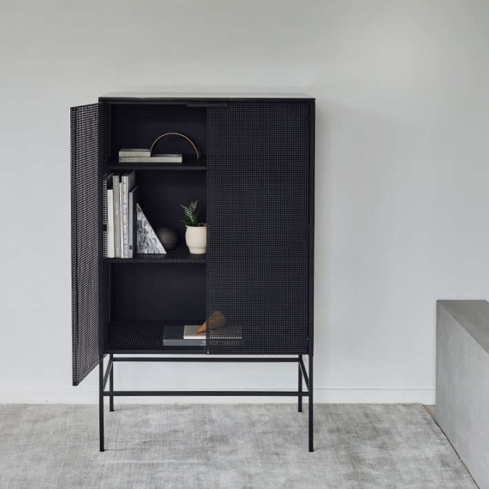 The ‘Kristina Dam Studio Grid Cabinet’ is made of black perforated steel and topped with a beautiful black marble plate. Available at Design Stuff