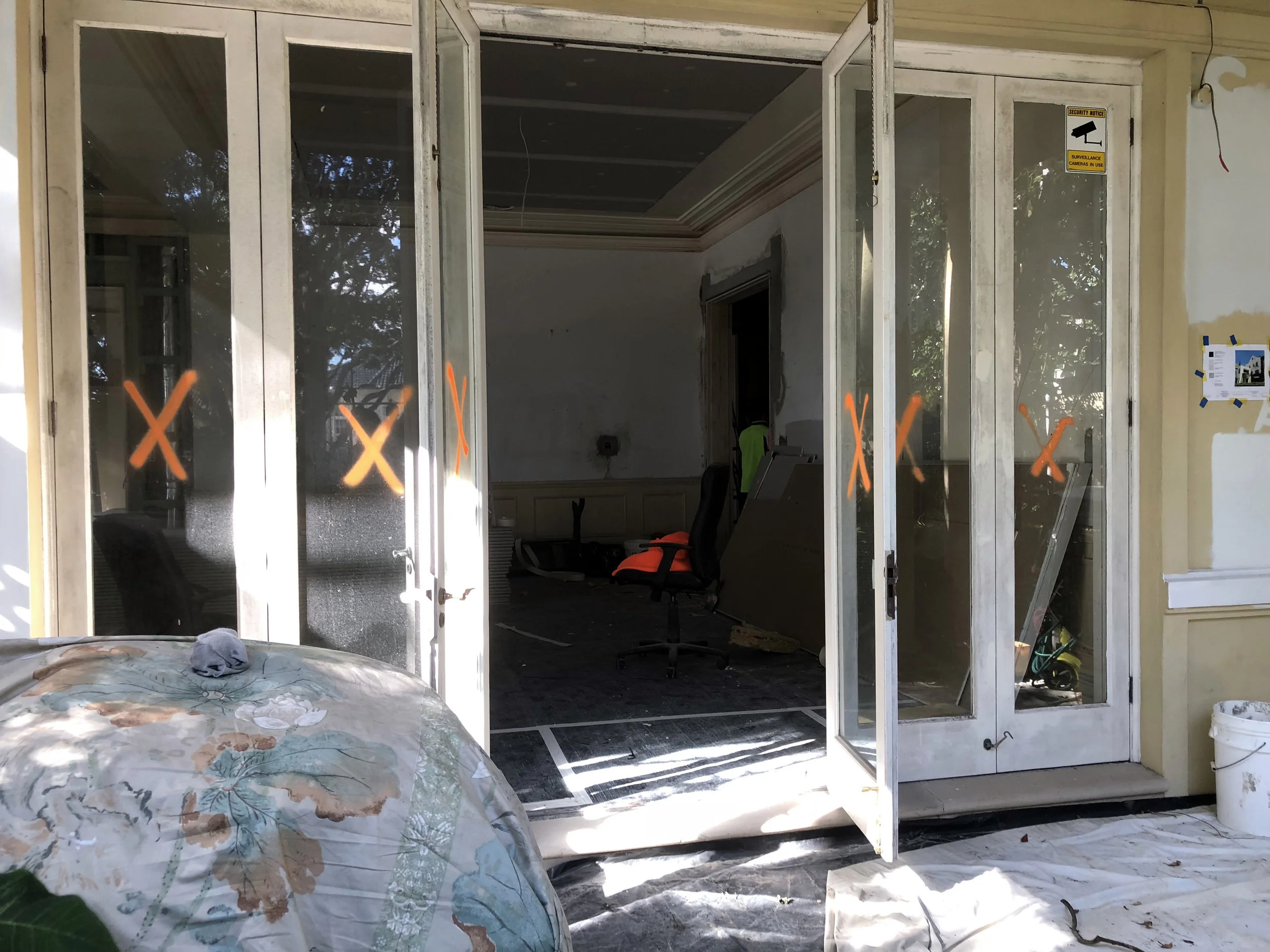 We are saying goodbye to the old bi-fold timber doors and are almost ready to welcome our new steel doors with their small profile and very elegant transom details.