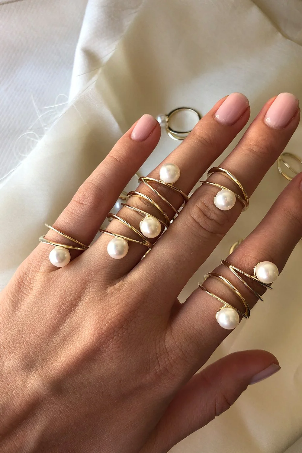 A contemporary twist on the old-fashioned pearl, we’re already adding this sculptural, double-band ring to our carts. One for us, one for mum… right?