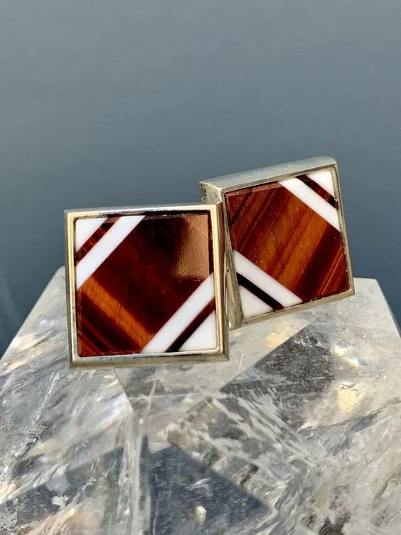 Rick Southwick Sterling Silver Cufflinks Go full luxe with these handcrafted cufflinks made with tiger’s eye and white jade