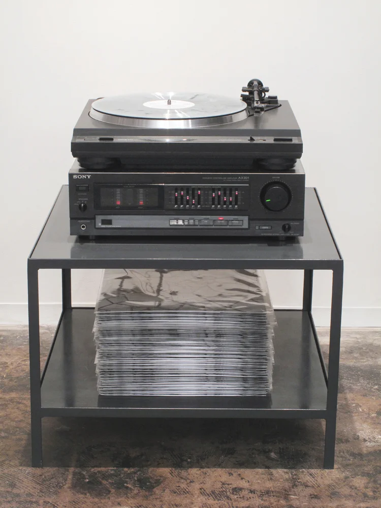   Rockslide Rocksolid , 2010: Custom audio table with vinyl records, 20 x 20 x 16".   