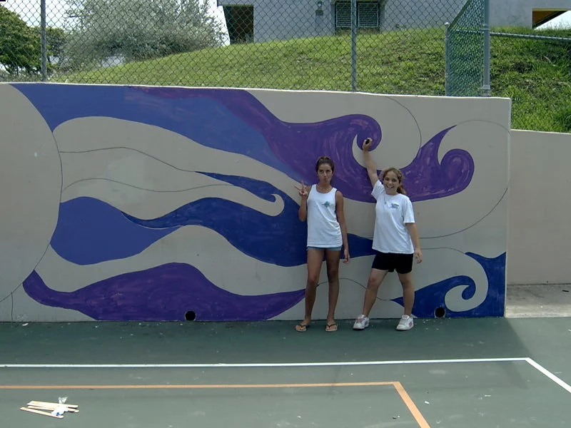 Students showing the progress (first coat of paint)