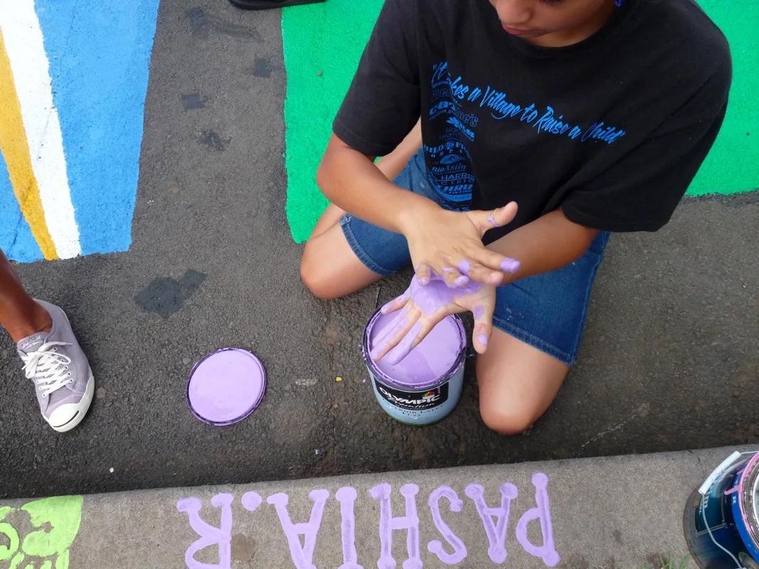 Pashia signing the curb