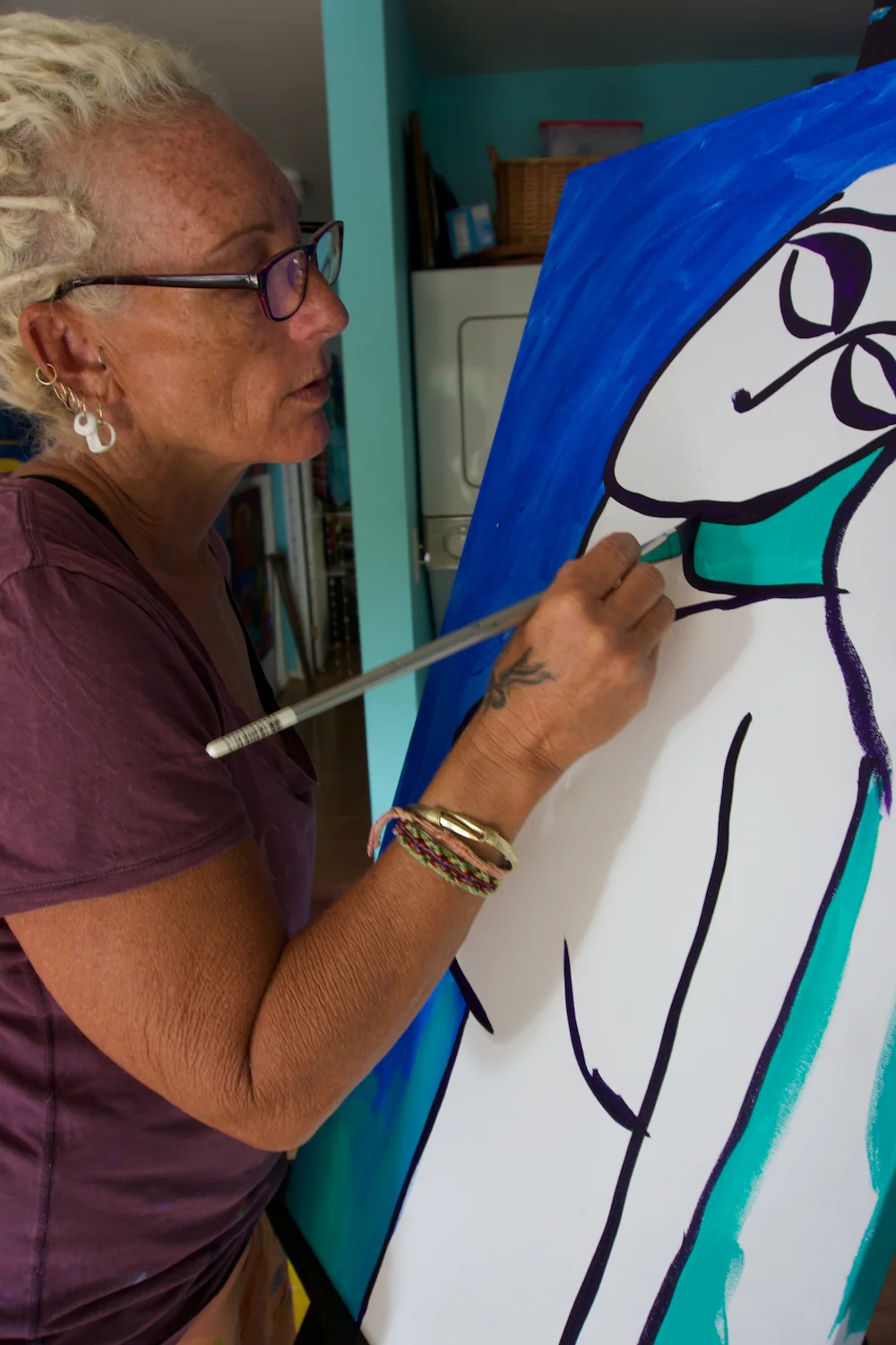 In the studio painting